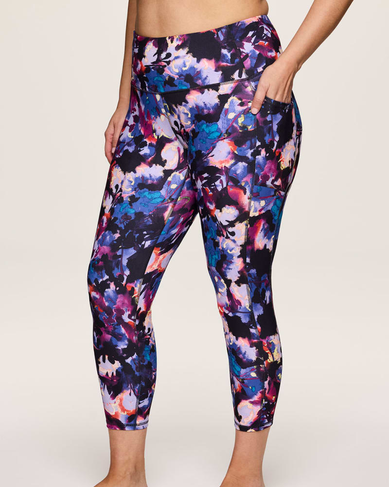 Front of a model wearing a size 2X Plus Flutter 7/8 Legging in Multi by RBX Active. | dia_product_style_image_id:353251